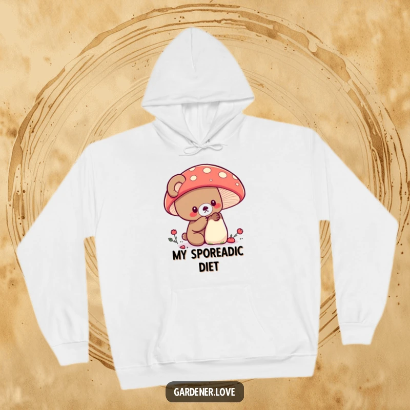 Funny Kawaii bear examining a large, colorful mushroom, cozy nature hoodie.