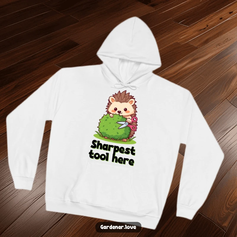Funny Kawaii hedgehog trimming a bush with tiny shears, cozy gardening hoodie.